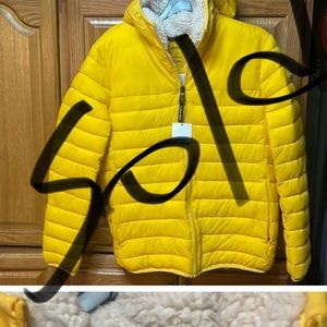 Beautiful woman’s Calvin Klein winter jacket